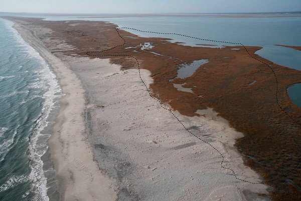 A drone photo of Cedar Island from January 2026 with the approximate location of the project site outlined. 
