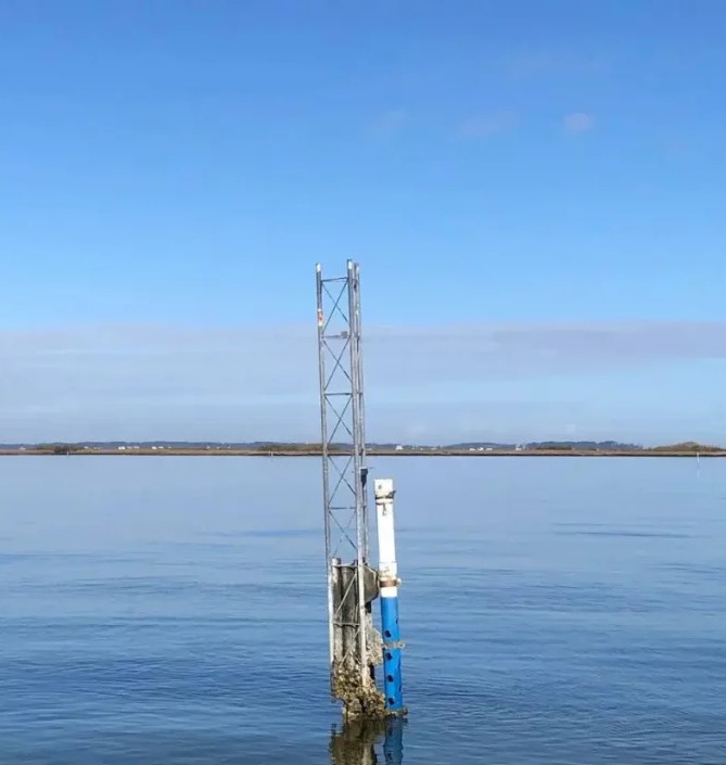 A continuous monitoring station collecting water quality data.