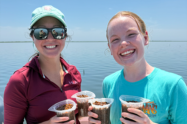 Intern Kendyl Farrell (right) with one of her ESL mentors, Senior Research Specialist Darian Kelley (left).