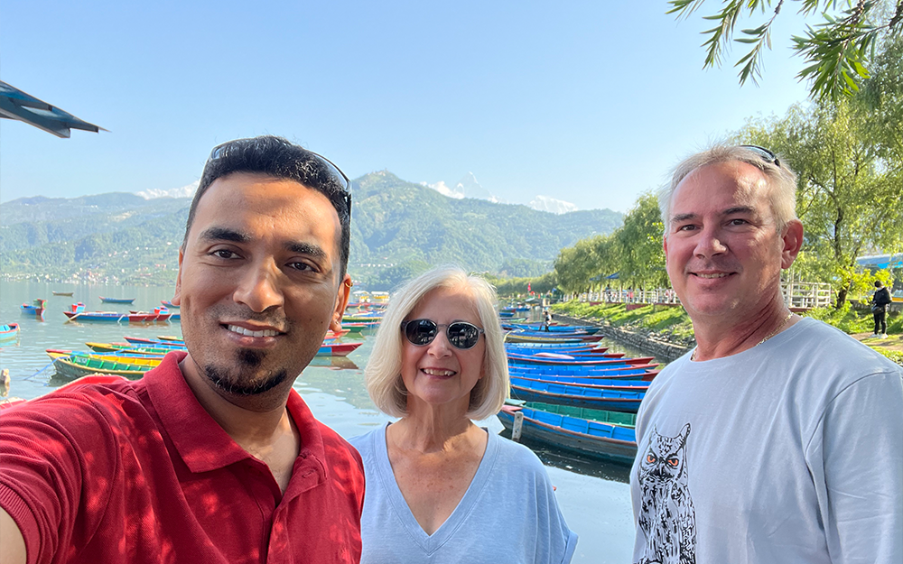 Vaskar Nepal (left), Mary Fabrizio (middle) and Senior Research Scientist Troy Tuckey (right) on the banks of Phewa Lake in Nepal in 2023. Photo provided by Mary Fabrizio.
