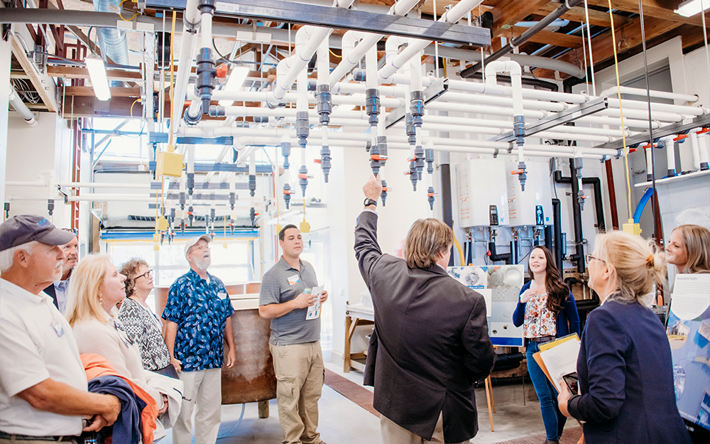 Event attendees tour the new, state-of-the-art facilities.