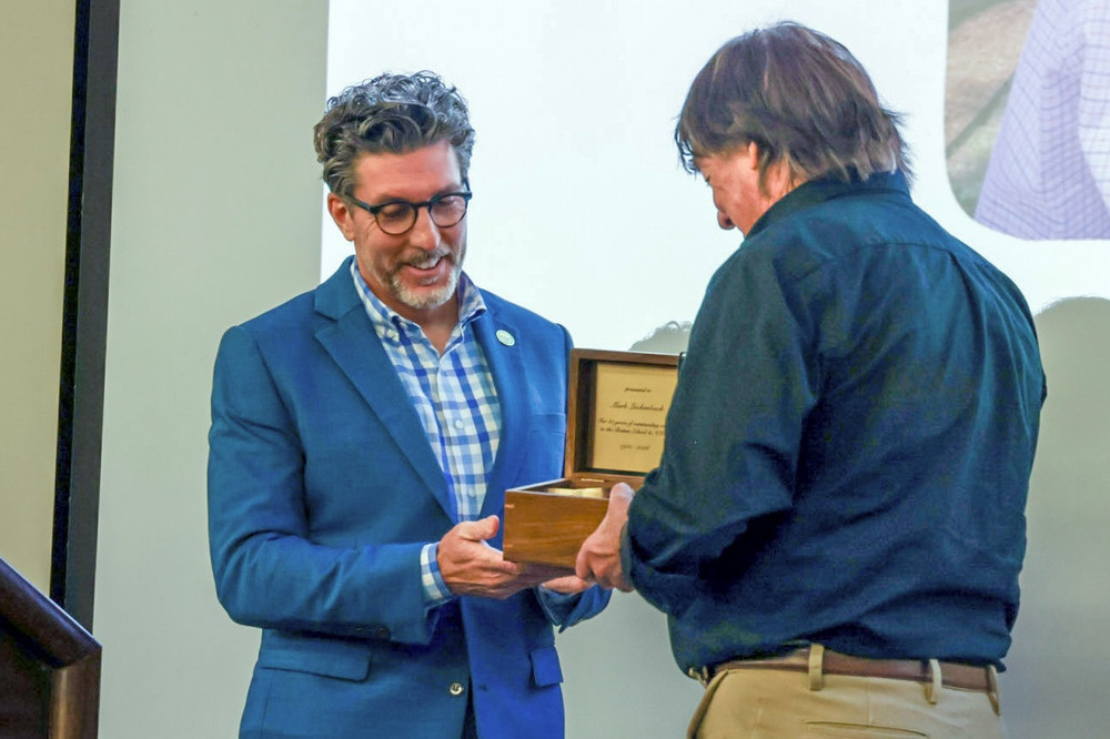 Dean and Director Derek Aday presents Mark Luckenbach with Lifetime Achievement Award