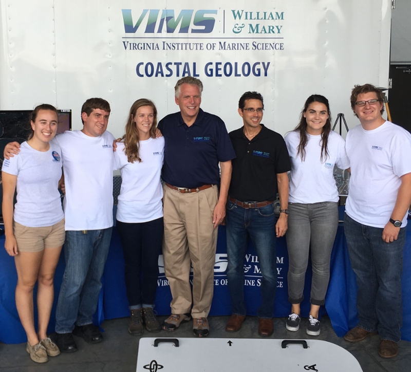 VIMS Coastal Geology Lab field crew poses smiling with Virginia governor Terry McAuliffe