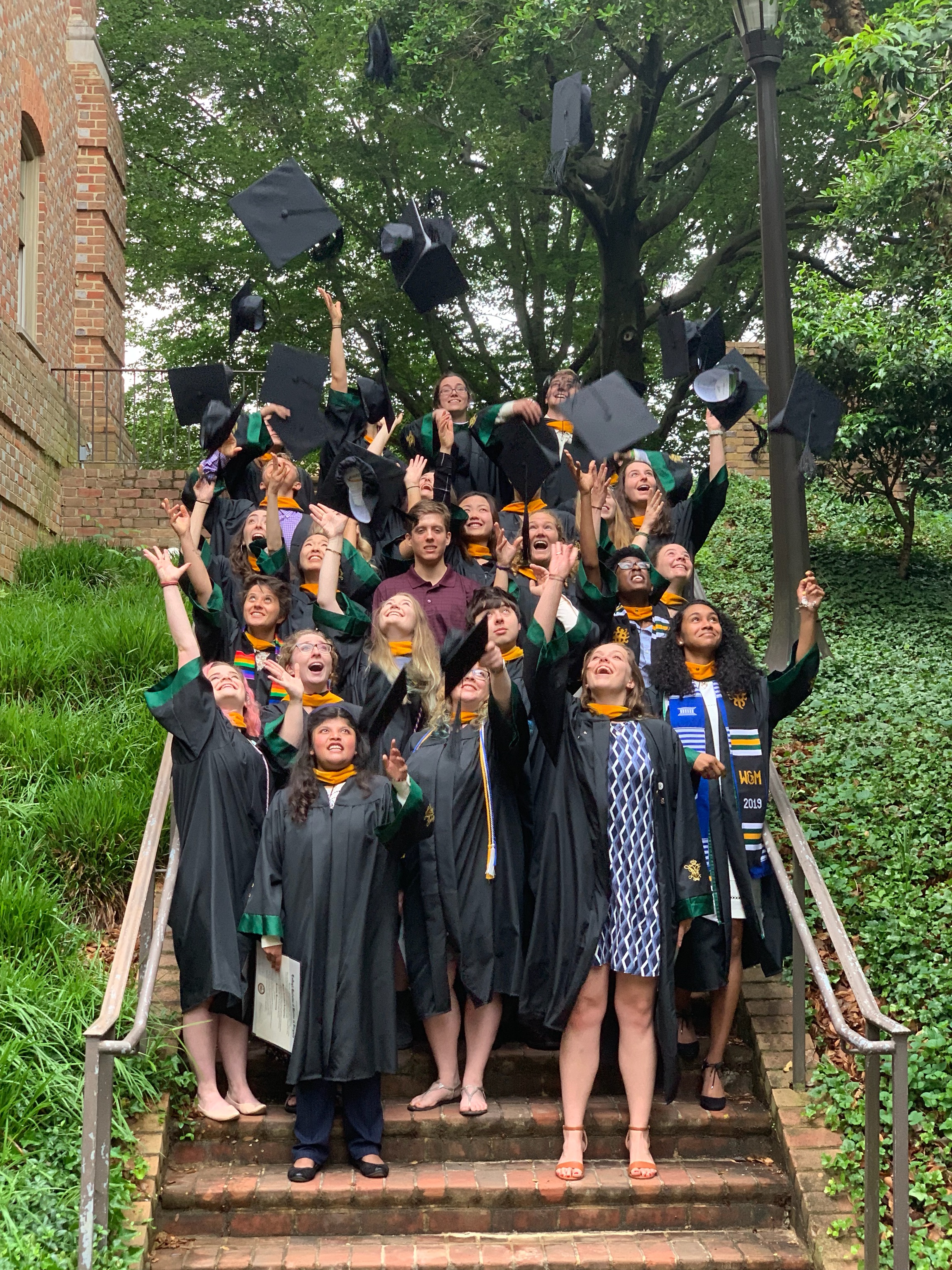 W&M Geology department class of 2019 throws caps in the air on graduation day